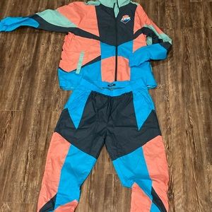 Pink dolphin track suit
